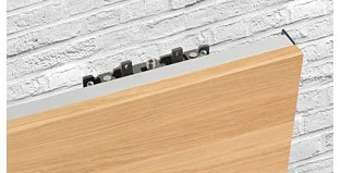 Angle the door panel into position and hook it onto the main assembly. Angle the door panel into position and hook it onto the main assembly.
